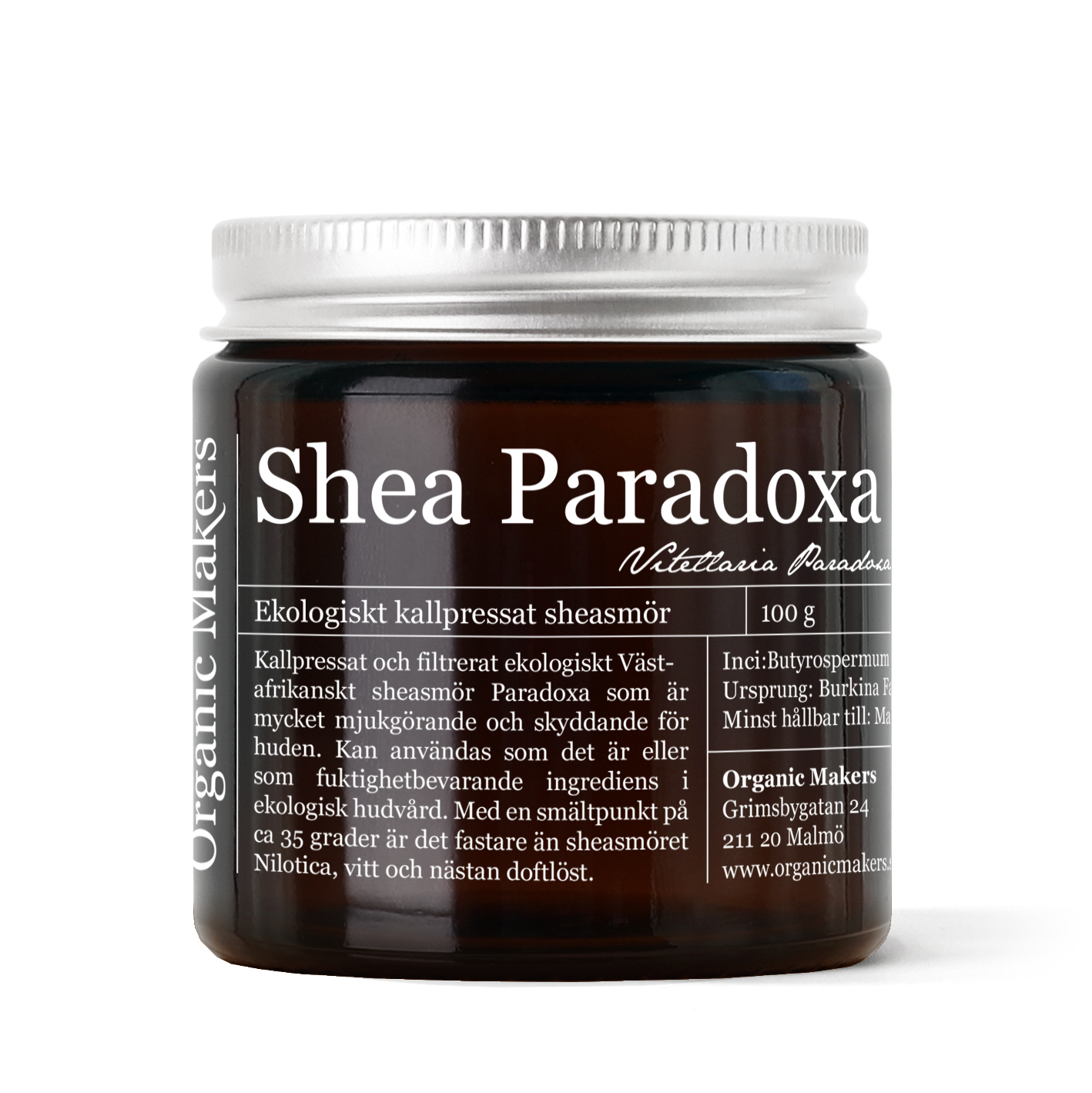 Sheasmör paradoxa i brun glasburk